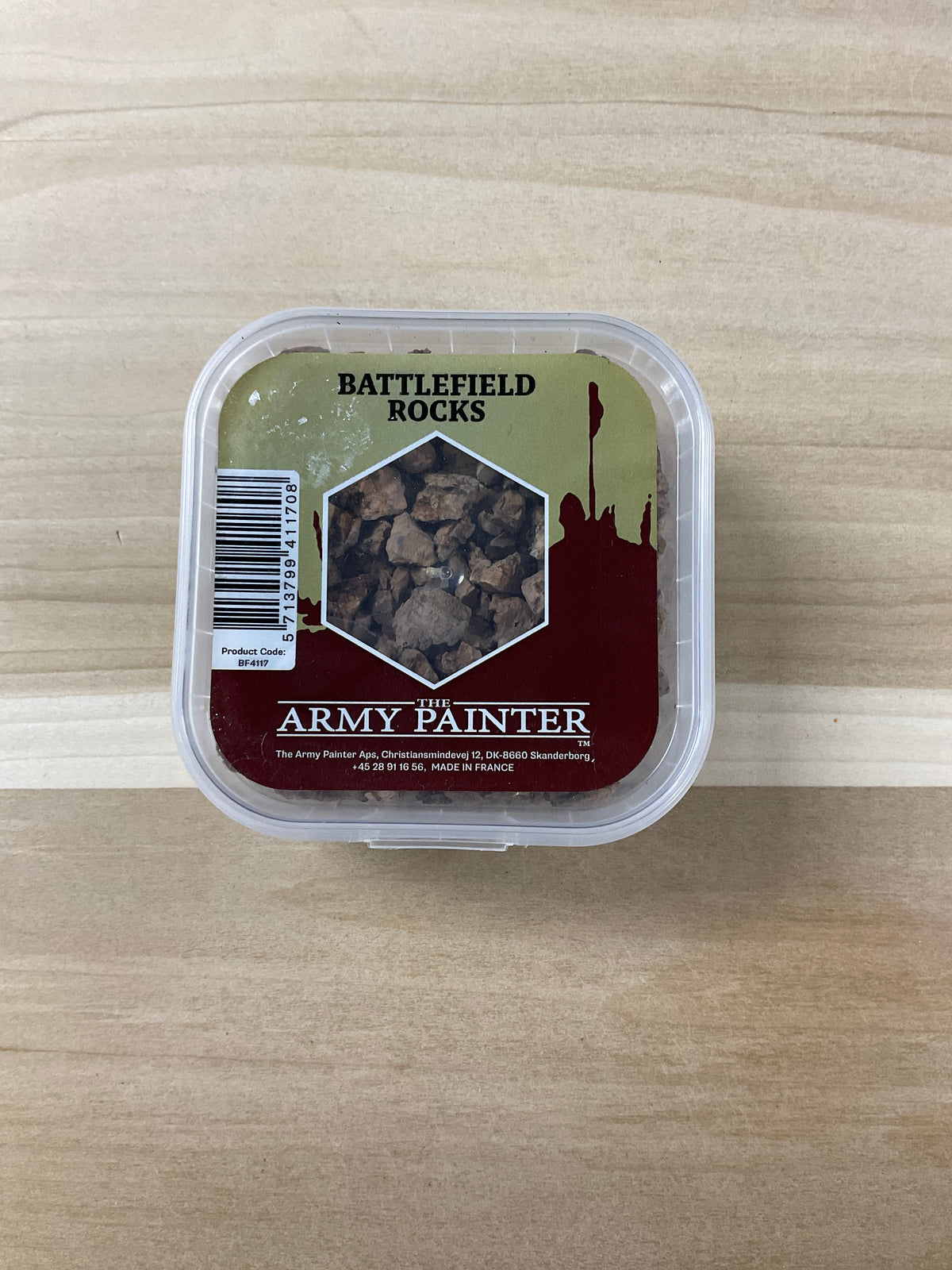Army painter.  Battlefield. Rocks