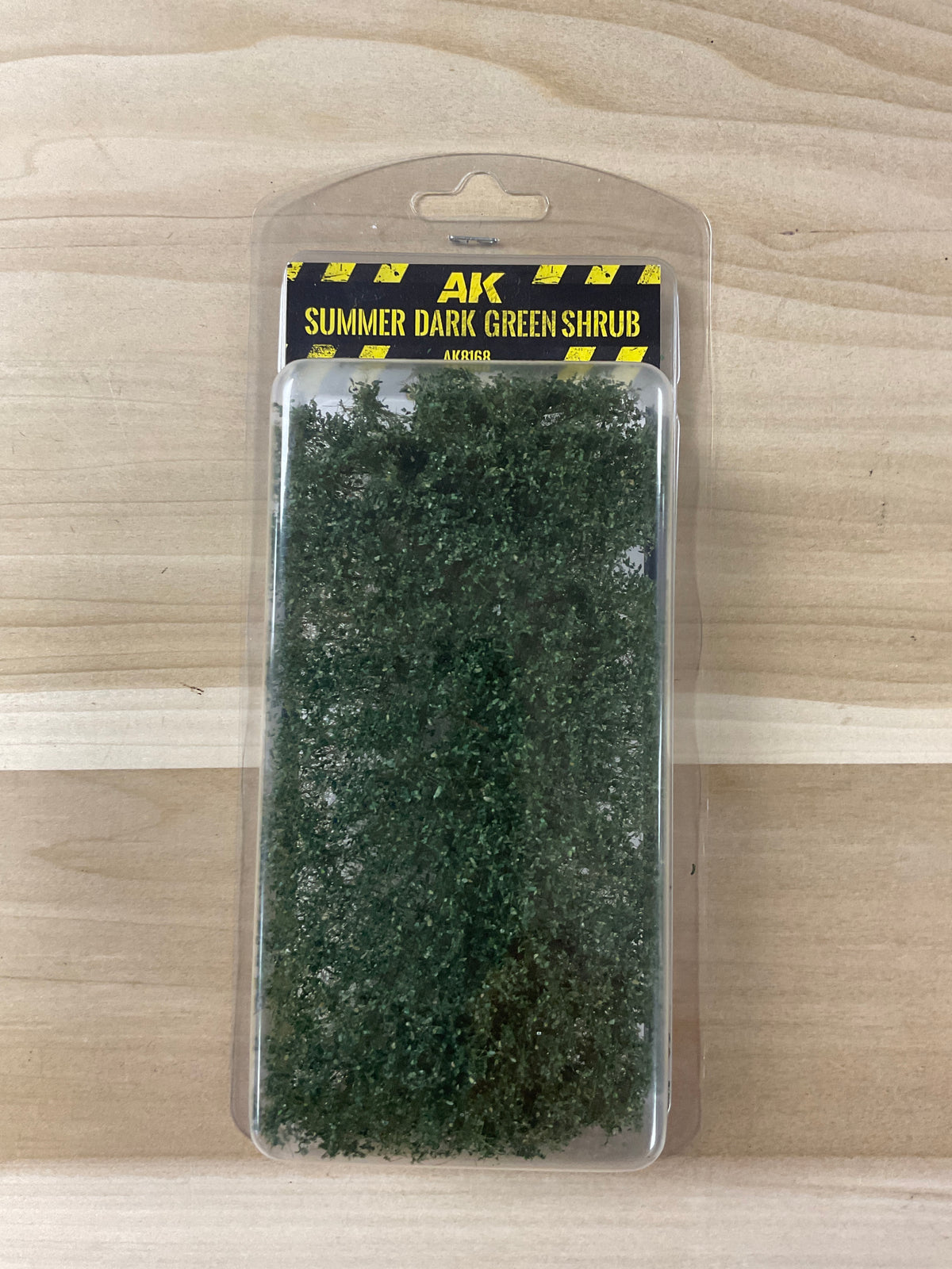 Ak.  Summer dark Green shrub